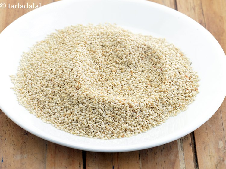 Step 5 – Transfer the sesame seeds on a plate, spread them well and cool completely.