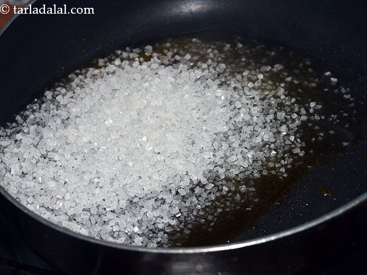 Step 6 – Next to make <strong>til chikki with sugar,</strong> put the sugar in the same broad non-stick …
