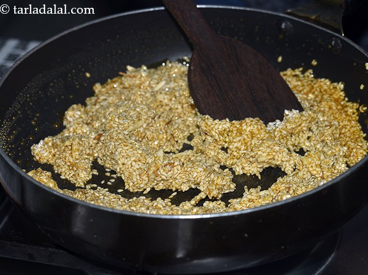 Step 11 – Mix well using a big spoon and cook on a medium flame for 1 minute, …