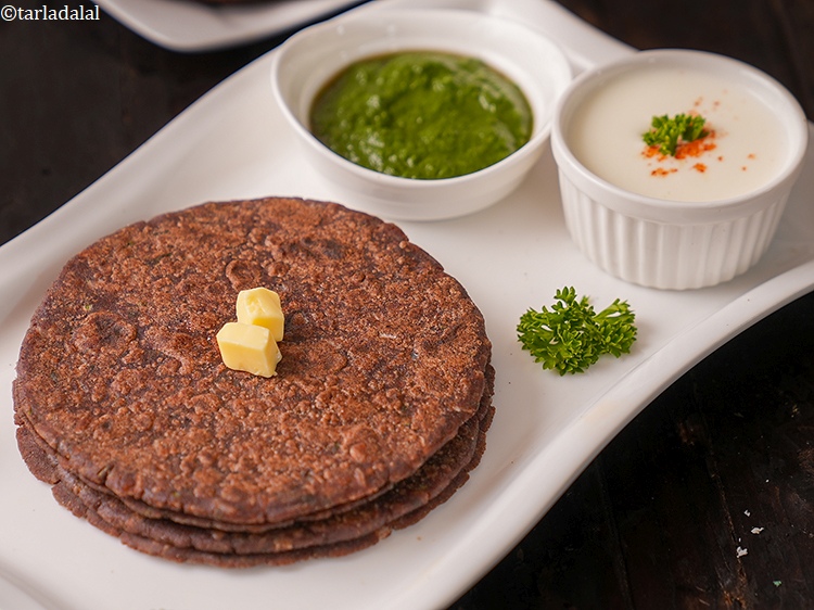 Step 27 – Serve nachni onion roti with curds.