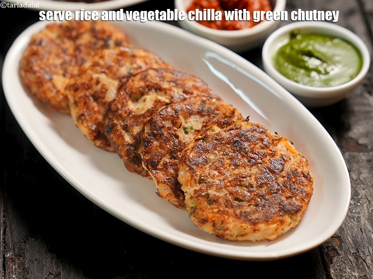 Step 32 – Serve&nbsp;<strong>rice and vegetable chilla&nbsp;</strong>with <a href="https://www.tarladalal.com/green-chutney-22266r">green chutney</a>.