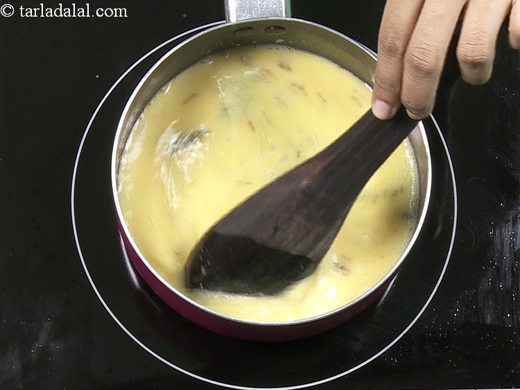 Step 21 – After adding the besan mixture to the tempering, remember to stir continuously to avoid lump …