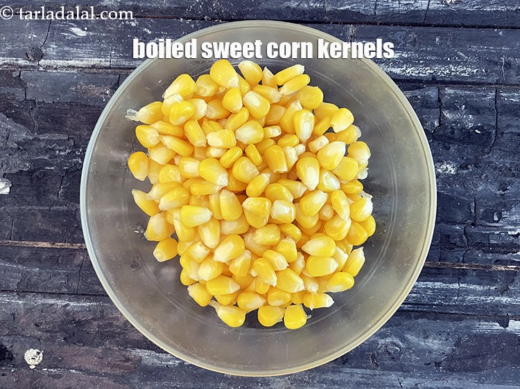 Step 25 – After boiling the corn, ensure it is drained completely. There should not be too much …