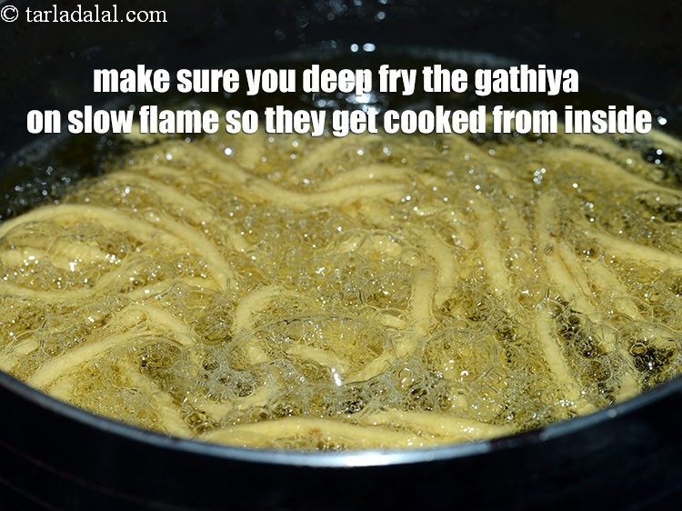 Step 26 – Make sure you deep fry the gathiya on slow flame so they get cooked from …