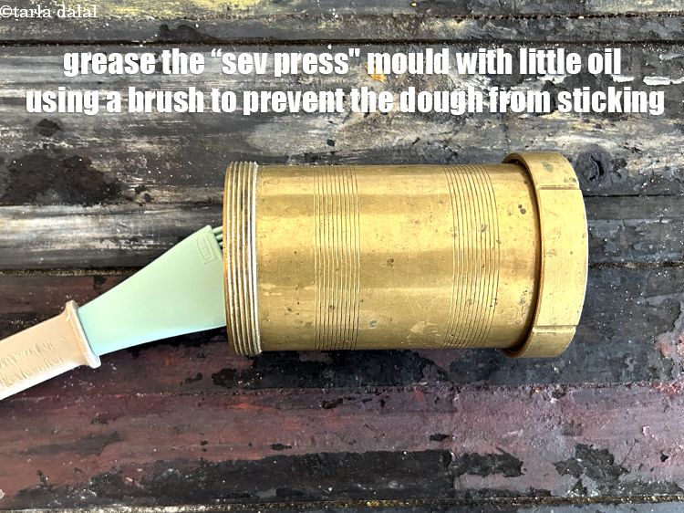 Step 32 – <meta charset="UTF-8" /> Grease the &ldquo;sev press&quot; mould with little oil using a brush to …