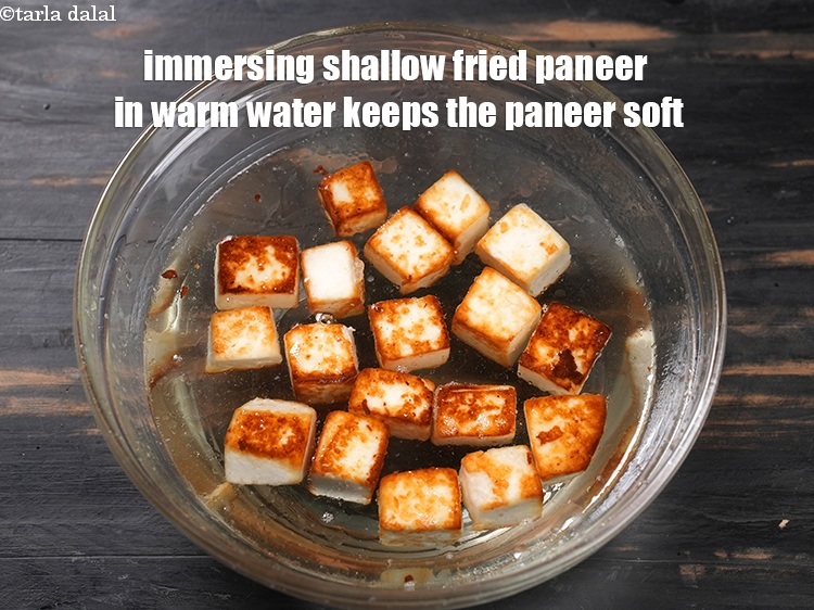 Step 43 – Immersing shallow fried paneer in warm water keeps the paneer soft.