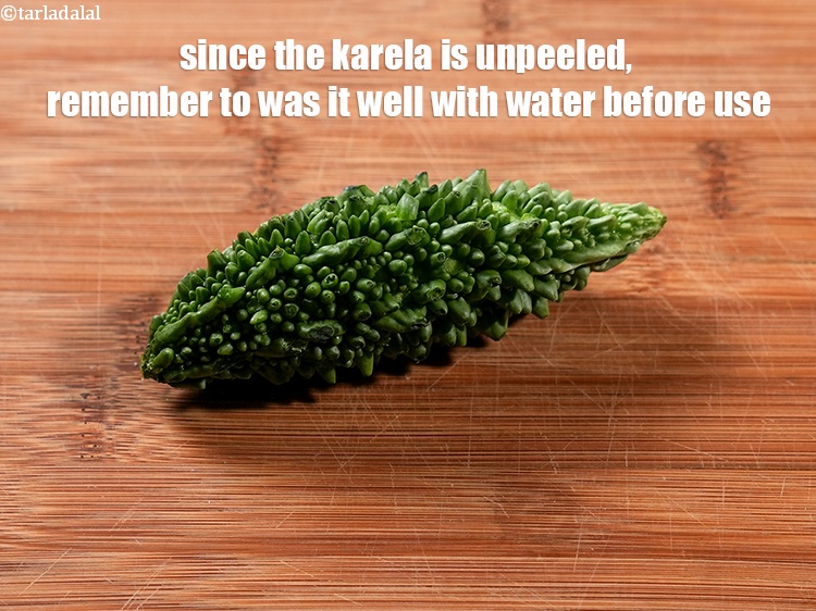 Step 22 – Since the karela is unpeeled, remember to was it well with water before use.