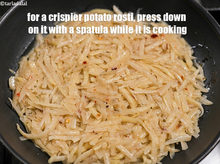 Step 29 – For a crispier potato rosti, press down on it with a spatula while it is …