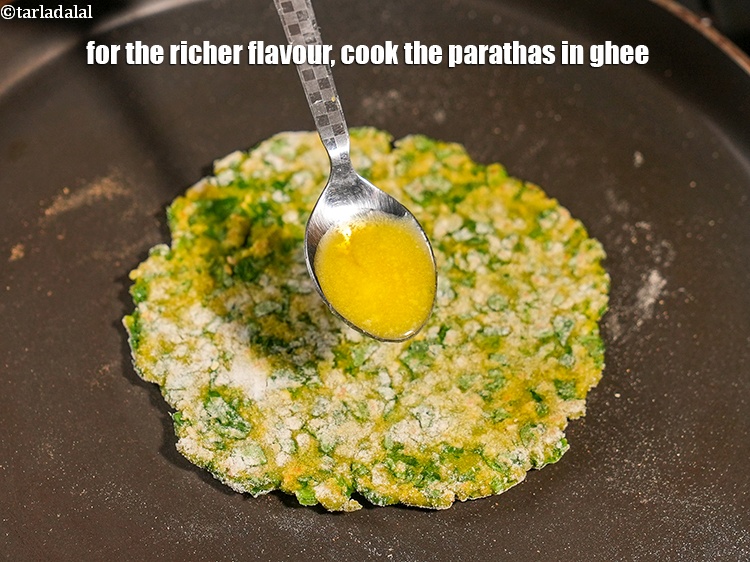 Step 22 – For the richer flavour, cook the parathas in ghee instead of oil.