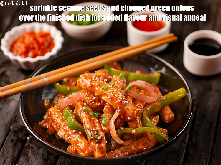 Step 53 – Sprinkle sesame seeds and chopped green onions over the finished dish for added flavour and …