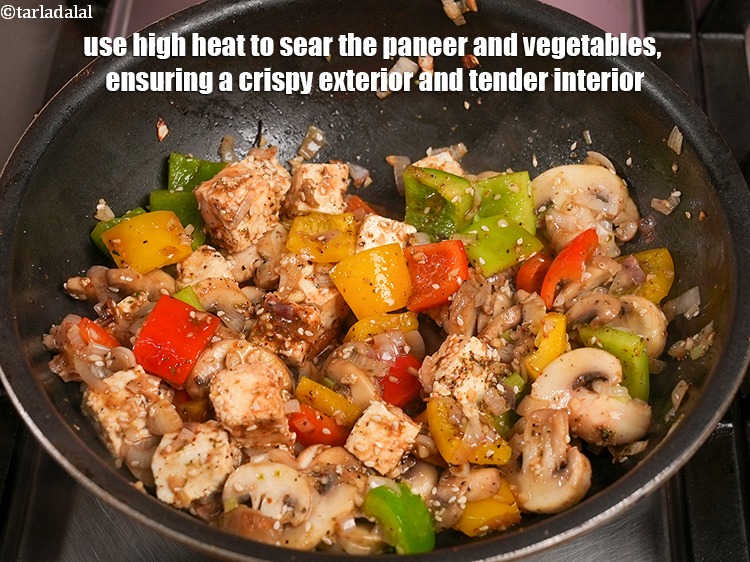 Step 21 – Use high heat to sear the paneer and vegetables, ensuring a crispy exterior and tender …