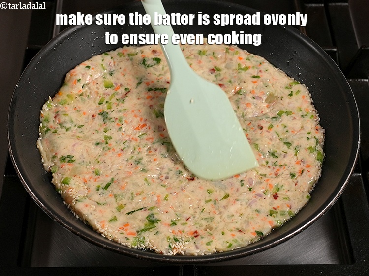 Step 32 – Make sure the batter is spread evenly to ensure even cooking.
