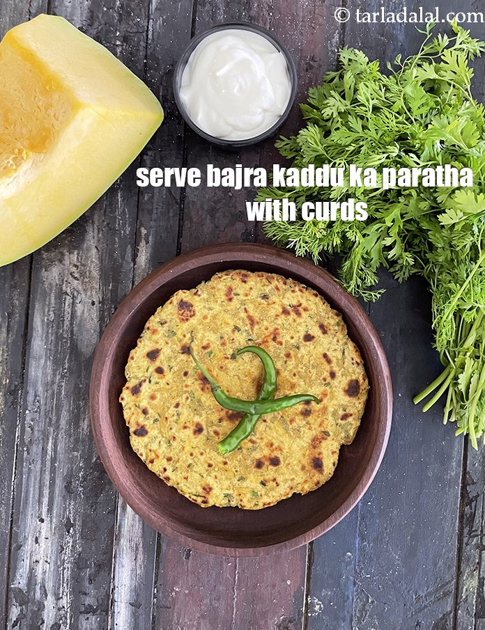 Step 31 – Serve&nbsp;<strong>bajra kaddu ka paratha</strong> with curds. See <a href="https://www.tarladalal.com/how-to-make-curd-or-dahi-at-home-2790r">how to make curds</a>.
