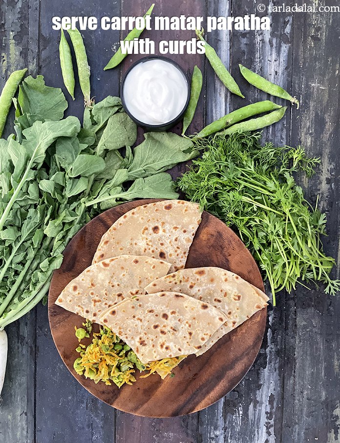 Step 43 – Serve <strong>carrot matar paratha&nbsp;</strong>with curds. See <a href="https://www.tarladalal.com/how-to-make-curd-or-dahi-at-home-2790r">how to make dahi</a>
