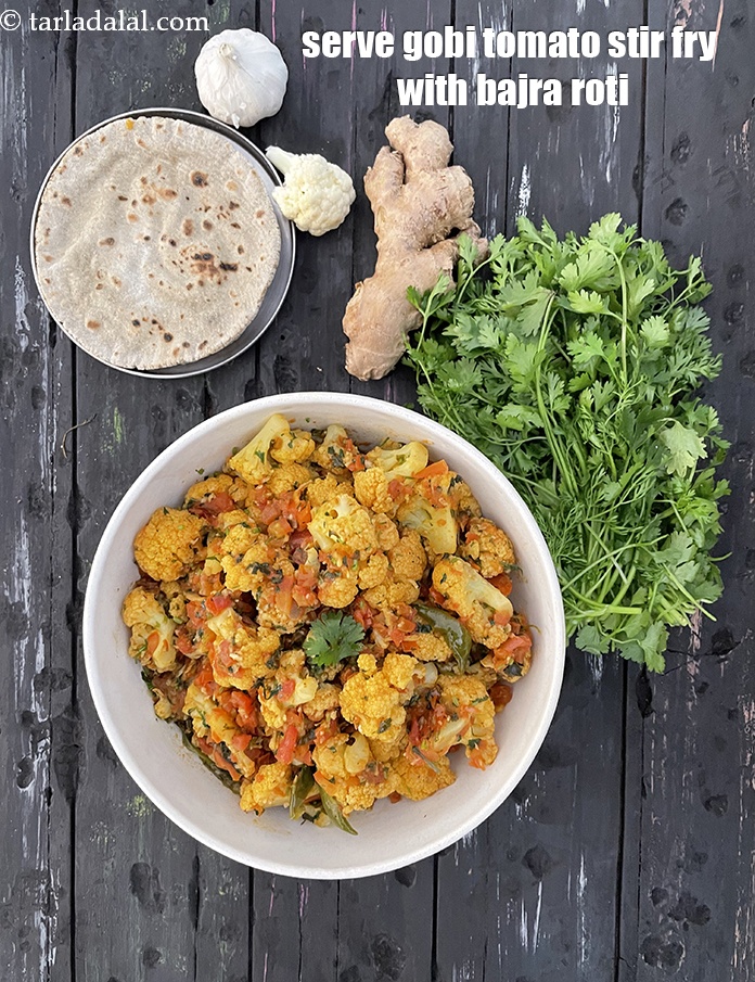 Step 28 – Serve <strong>gobi tomato stir fry </strong>with bajra roti.