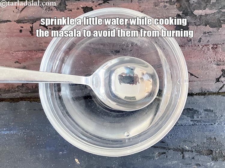 Step 37 – Sprinkle a little water while cooking the masala&nbsp;to avoid them from burning.