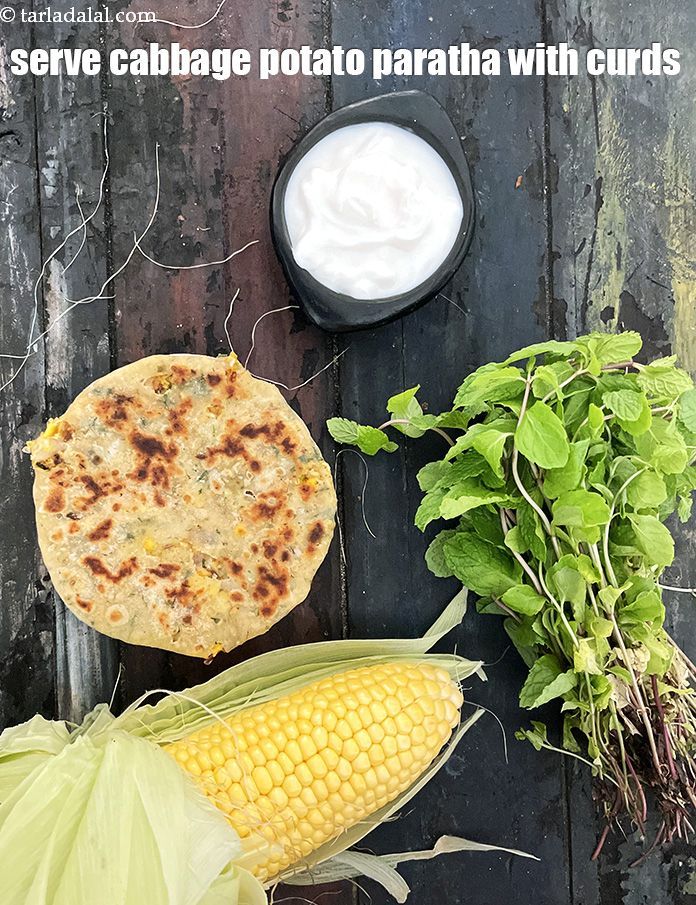 Step 61 – Serve&nbsp;corn and vegetable paratha &nbsp;with curds.