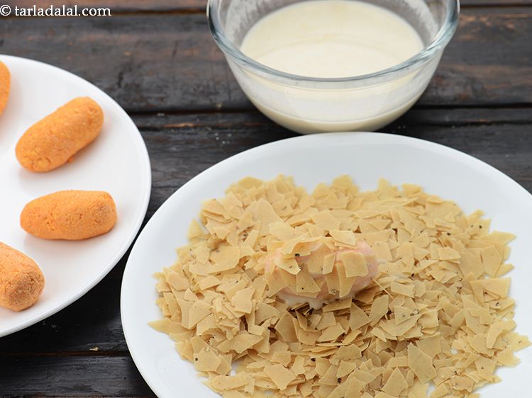 Step 25 – To coat them in papad takes time so be patient.&nbsp;