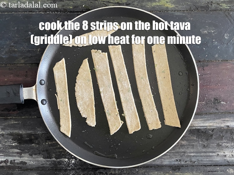 Step 27 – <meta charset="UTF-8" /> Cook the 8 strips&nbsp;on the hot tava (griddle) on low heat for …