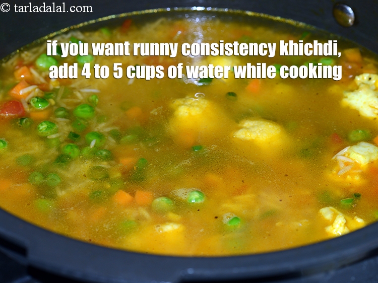 Step 44 – If you want runny consistency khichdi, add 4 to 5 cups of water while cooking.