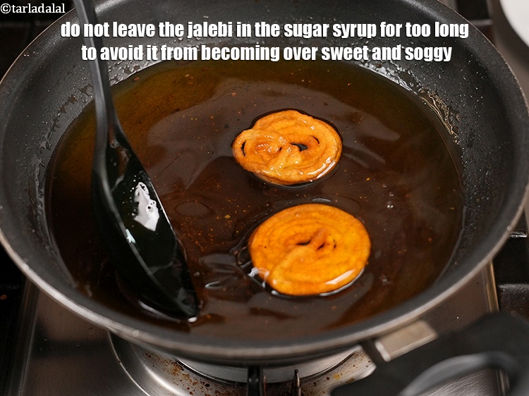 Step 31 – Do not leave the jalebi in the sugar syrup for too long to avoid it …