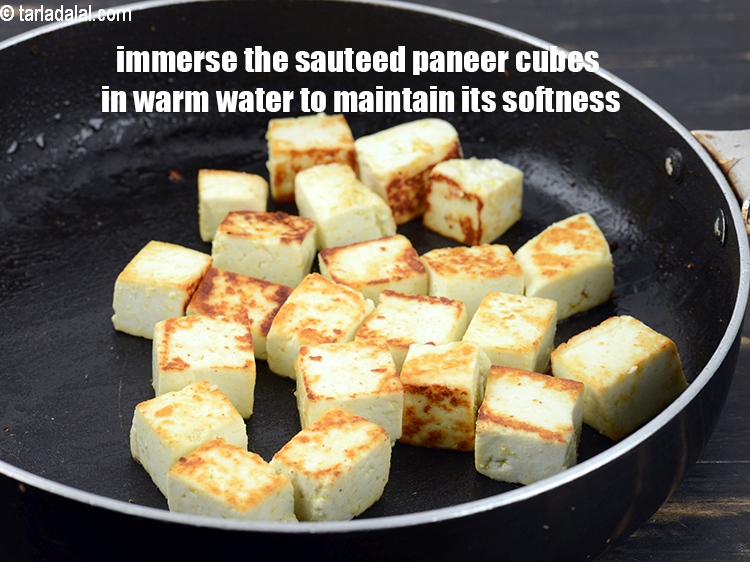 Step 31 – Immerse the sauteed paneer cubes in warm water to maintain its softness.