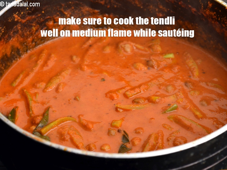 Step 31 – Make sure to cook the tendli well on medium flame while saut&eacute;ing.