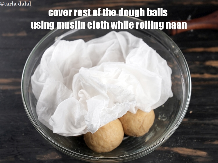 Step 30 – Cover rest of the dough balls using muslin cloth while rolling naan.