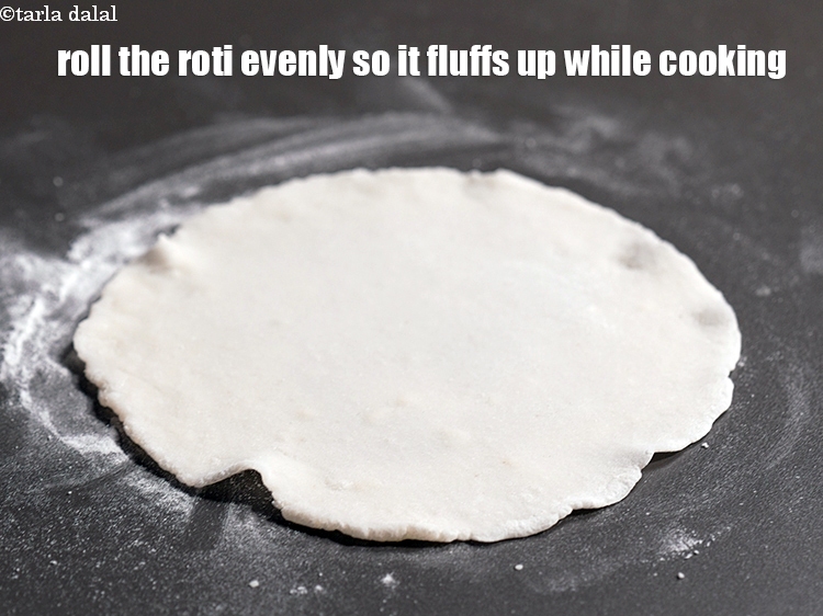 Step 17 – Roll the roti evenly so it fluffs up while cooking.