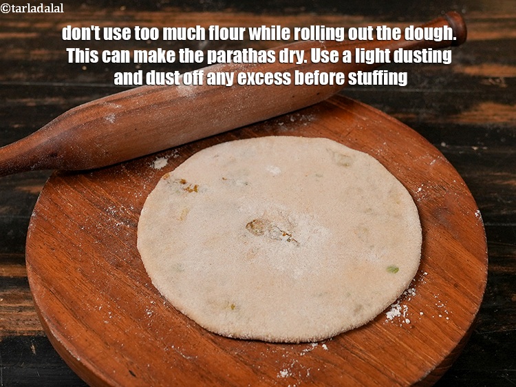 Step 32 – Don't use too much flour while rolling out the dough. This can make the parathas …