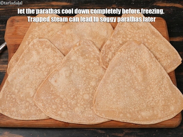 Step 28 – Let the parathas cool down completely before freezing. Trapped steam can lead to soggy parathas …