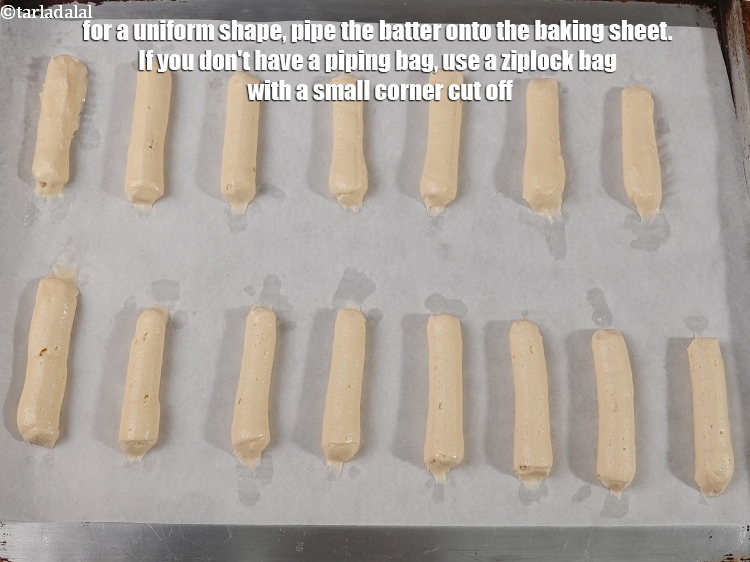 Step 22 – For a uniform shape, pipe the batter onto the baking sheet. If you don&#39;t have …