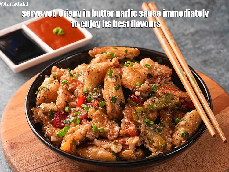 Step 31 – Serve veg crispy in butter garlic sauce immediately to enjoy its best flavours.