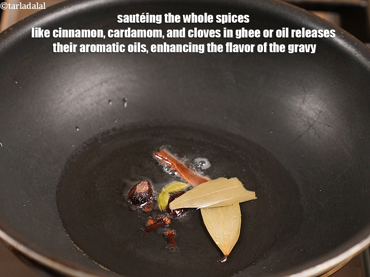 Step 32 – Saut&eacute;ing the whole spices like cinnamon, cardamom, and cloves in ghee or oil releases their …