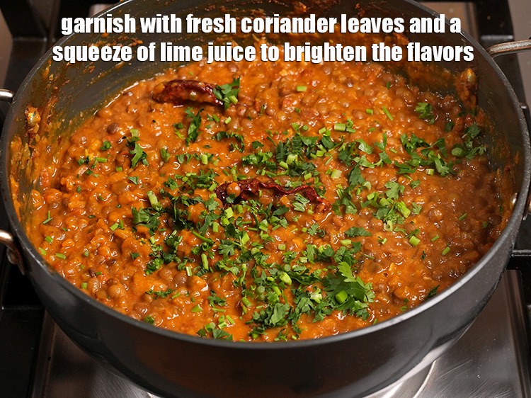 Step 50 – Garnish with fresh coriander leaves and a squeeze of lime juice to brighten the flavors.