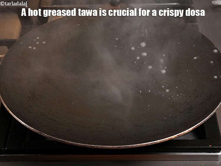 Step 43 – A hot greased tawa is crucial for a crispy dosa.