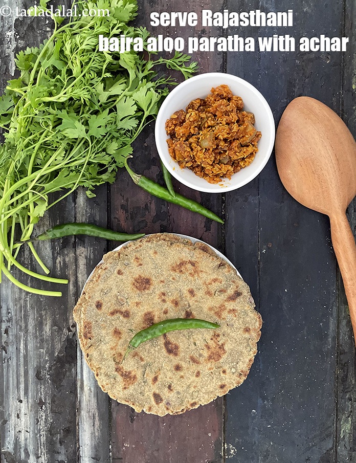 Step 32 – Serve Rajasthani &nbsp;bajra aloo paratha with achar.