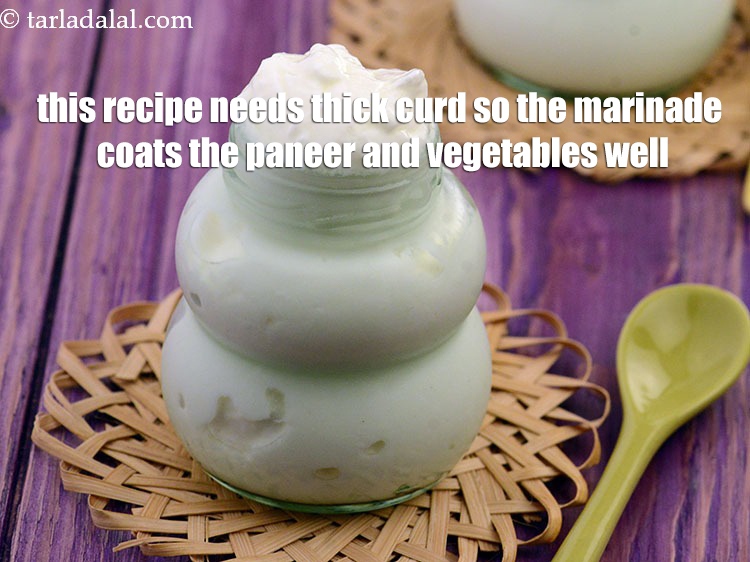 Step 28 – This recipe needs thick curd so the marinade coats the paneer and vegetables well.