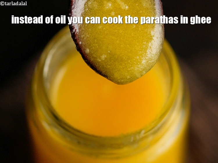 Step 26 – Instead of oil you can cook the parathas in ghee.