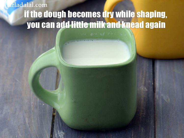 Step 26 – If the dough becomes dry while shaping, you can add little milk and knead again.<br …