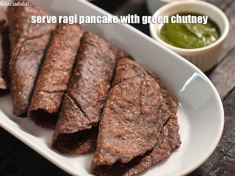 Step 26 – Serve <strong>ragi pancake</strong> with <a href="https://www.tarladalal.com/green-chutney-how-to-make-green-chutney-recipe-22266r">green chutney</a>.