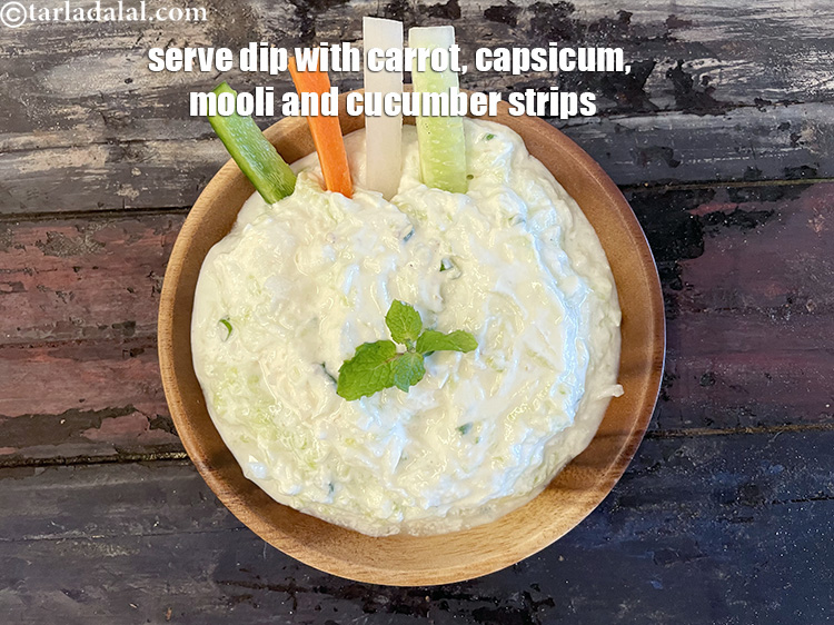 Step 17 – Serve <strong>radish cucumber curd dip</strong> with carrot, cucumber, mooli and capsicum strips.