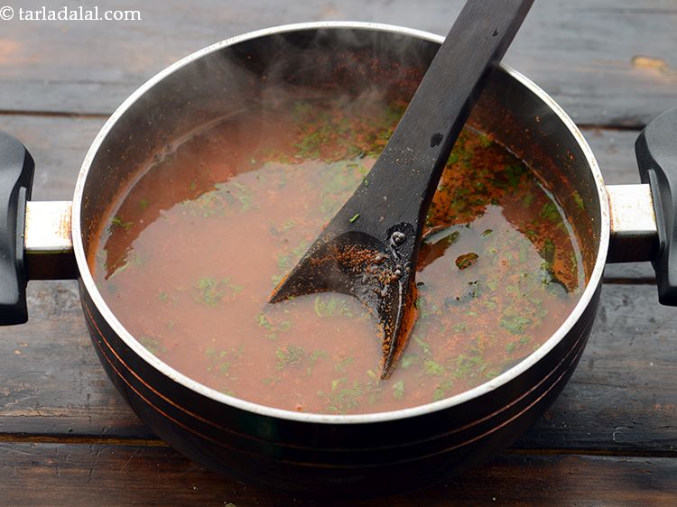 Step 50 – Make sure the rasam is very hot before you pour it over the idlis.
