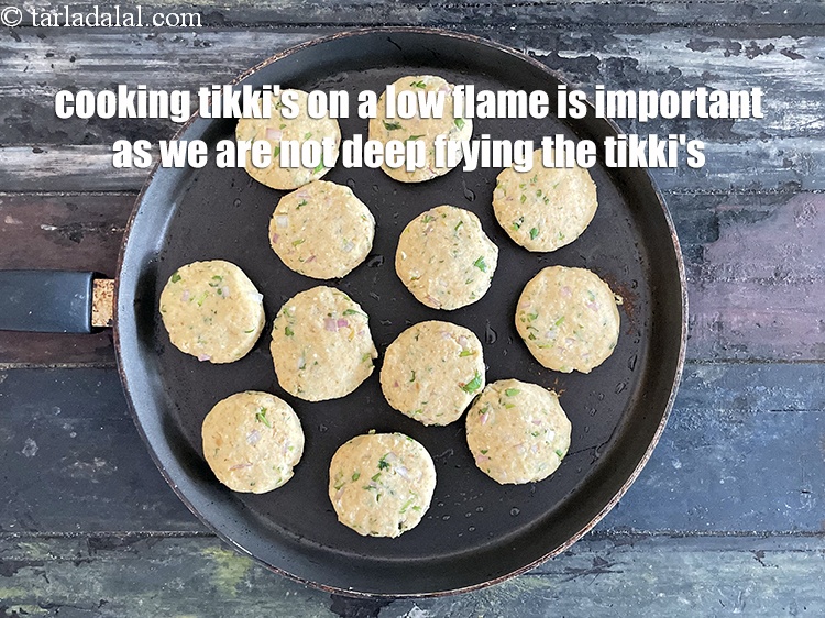 Step 44 – Cooking tikki&#39;s on a low flame is important as we are not deep frying the …