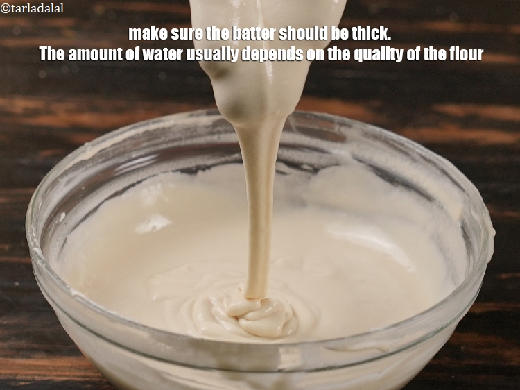 Step 32 – Make sure the batter should be thick. The amount of water usually depends on the …