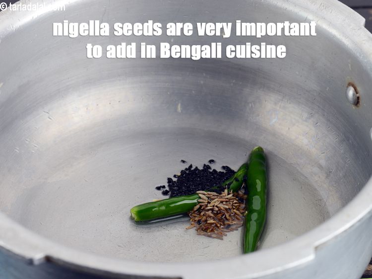 Step 32 – Nigella seeds are very important to add in Bengali cuisine.<br /> &nbsp;