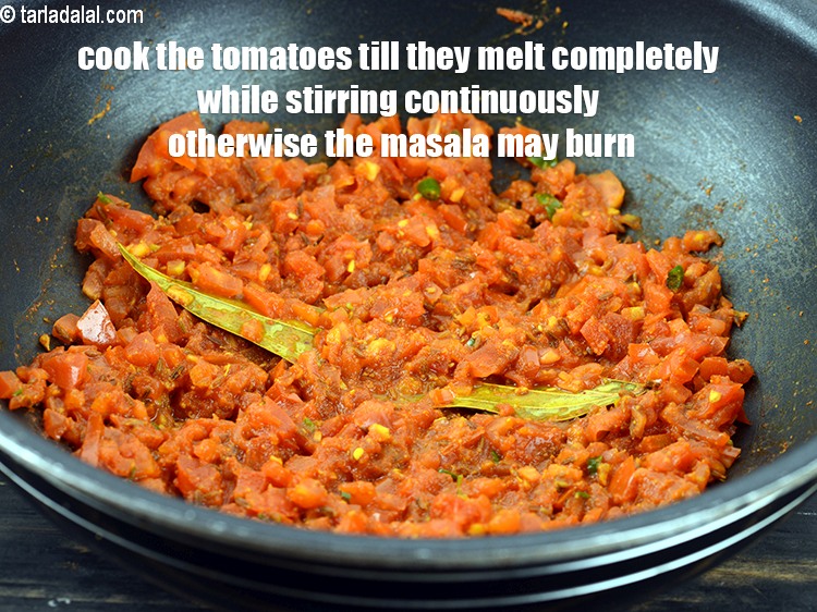 Step 32 – Cook the tomatoes till they melt completely while stirring continuously otherwise the masala may burn.