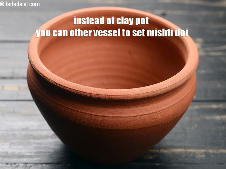 Step 24 – Instead of clay pot you can other vessel to set mishti doi.
