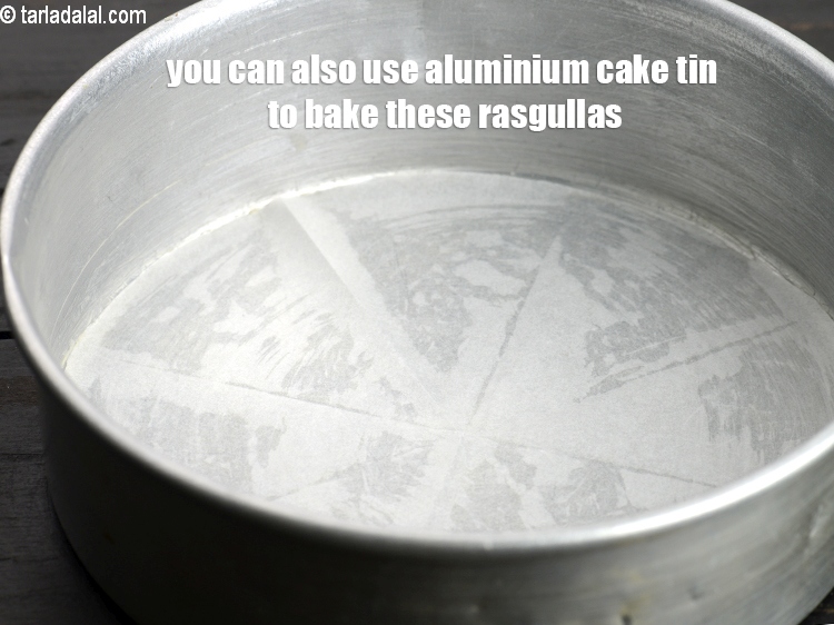 Step 17 – You can also use aluminium cake tin to bake these rasgullas.