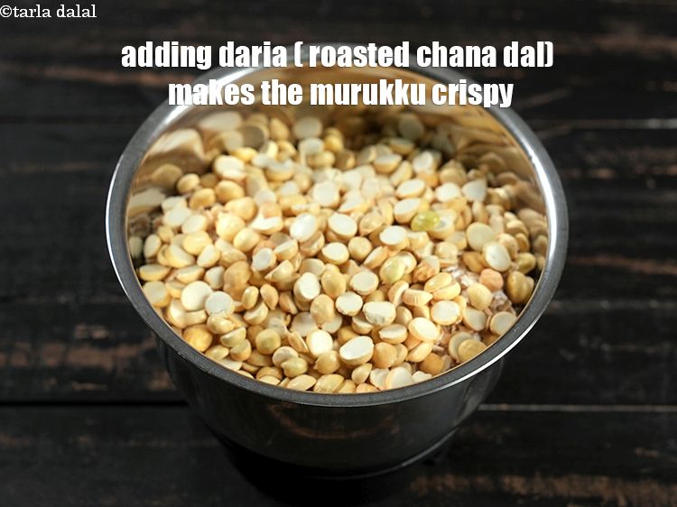 Step 25 – Adding daria ( roasted chana dal) makes the murukku crispy.